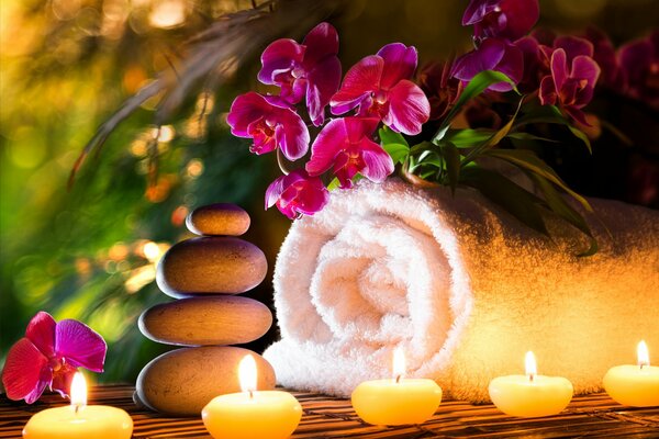 Towel and candles in the spa