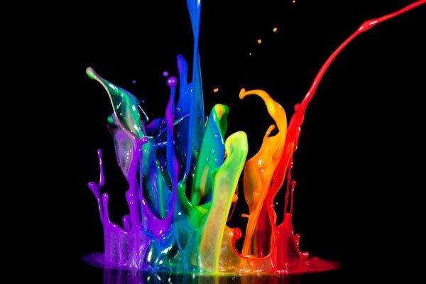 Multicolored splashes of colors on a dark background