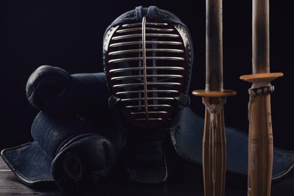 Protective mask and two katanas made of samurai ammunition