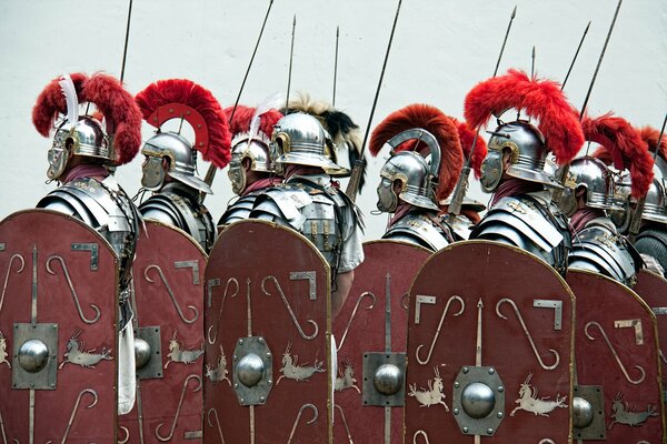 A squad of ancient soldiers with spears in armor