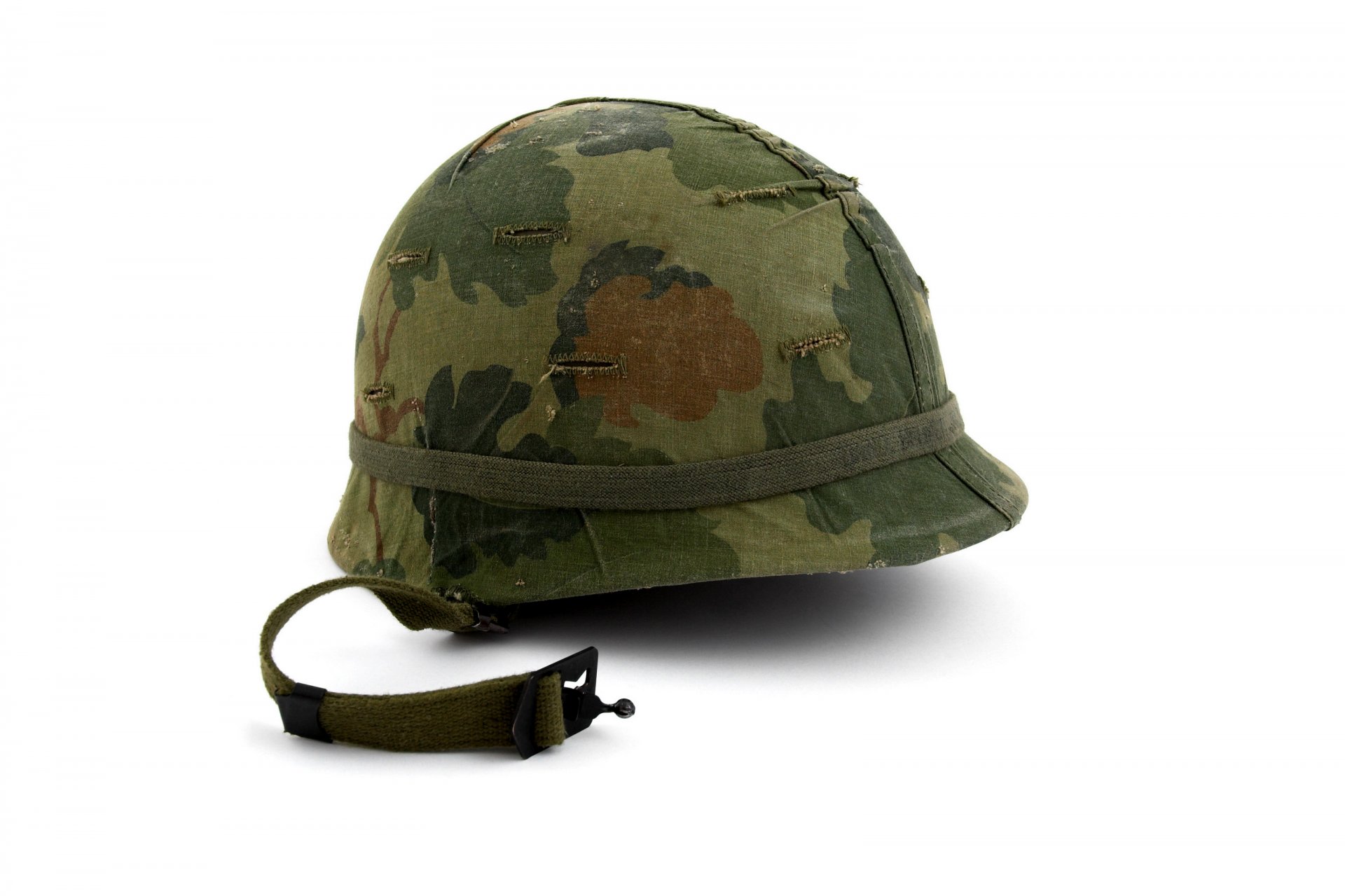 ammunition helmet military flowers khaki camouflage bag chin belt special gum attachment masking white background shadow