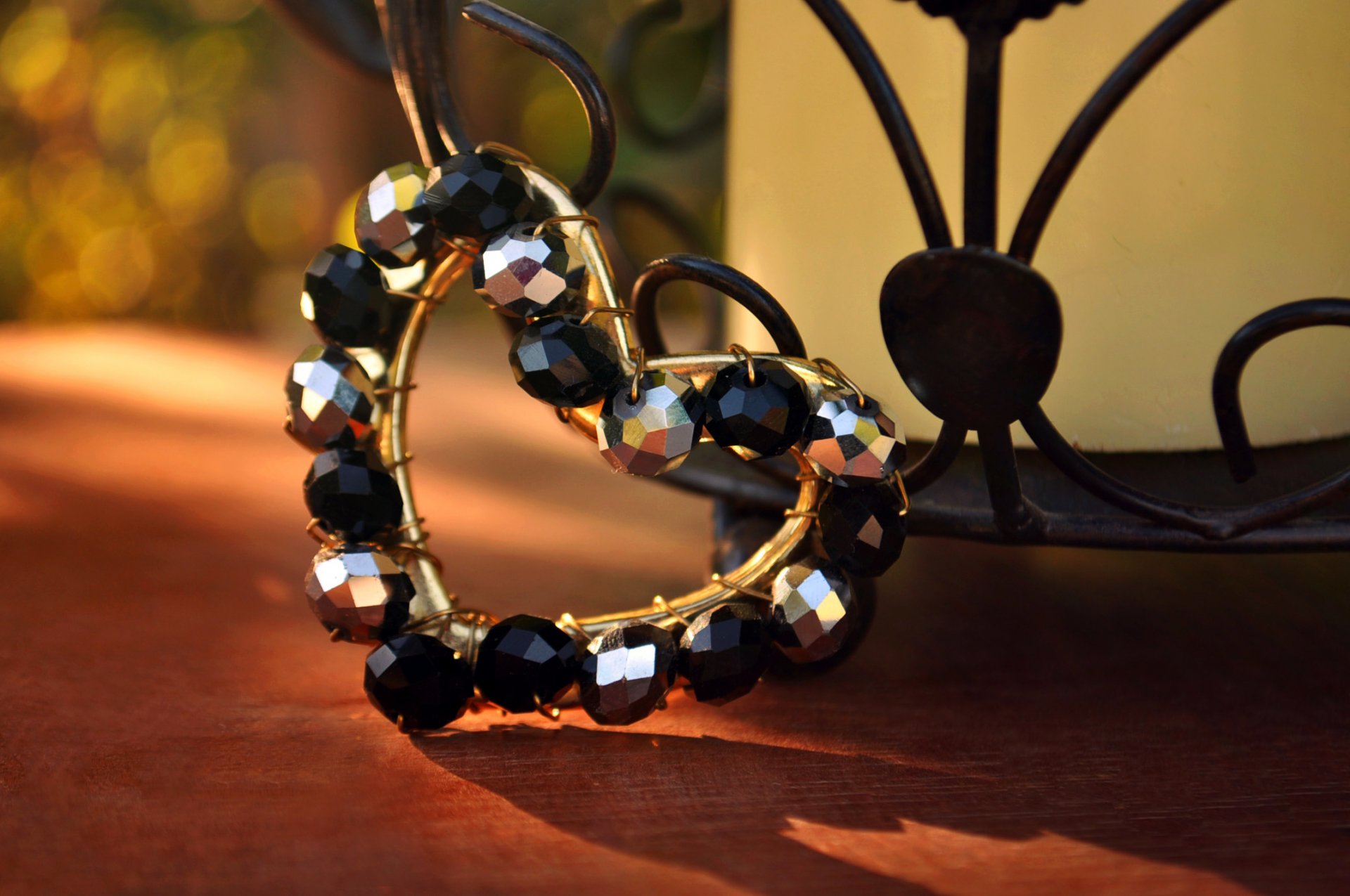 heart heart beads black silver table shadow bokeh