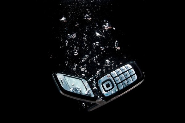 Nokia clamshell phone in the water