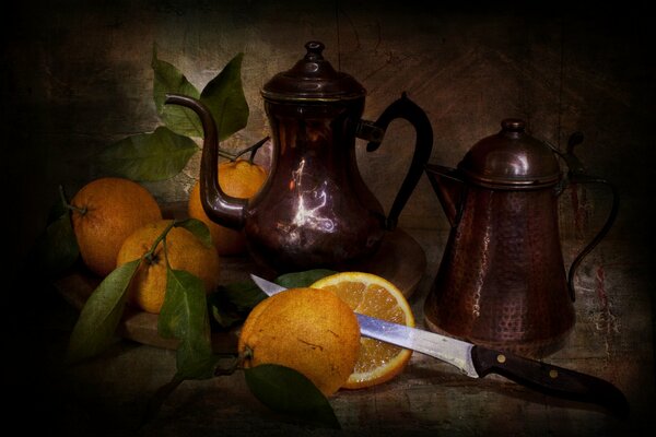 Nature morte Vintage avec vaisselle en cuivre et oranges