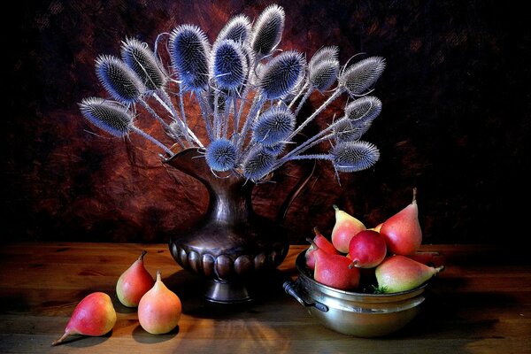 Vintage still life with dried flowers and red pears