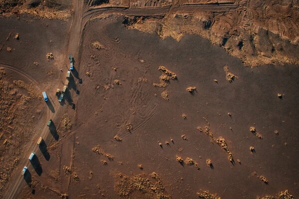 Cars on the road in the desert photo from a drone