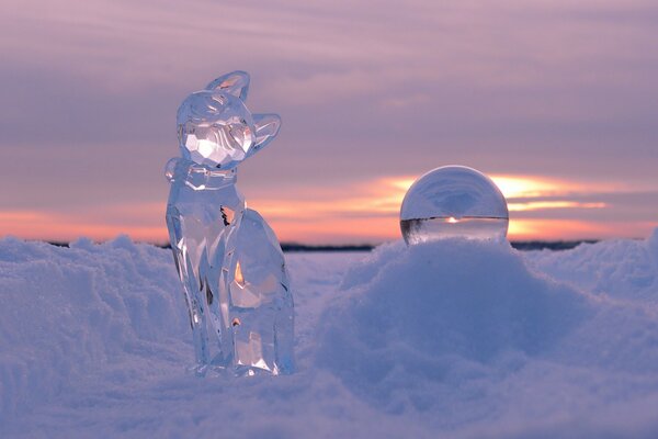 Ice sculpture of a cat in the snow