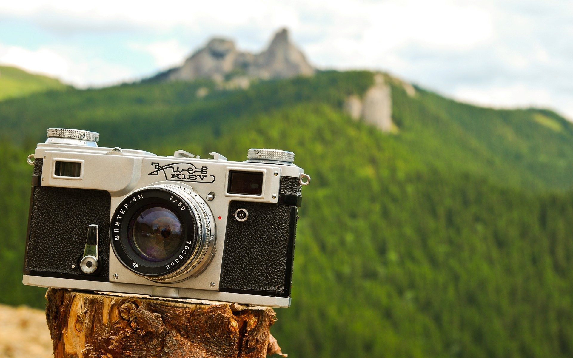 miscellaneous camera camera lens rocks hills nature greenery background wallpaper widescreen fullscreen widescreen