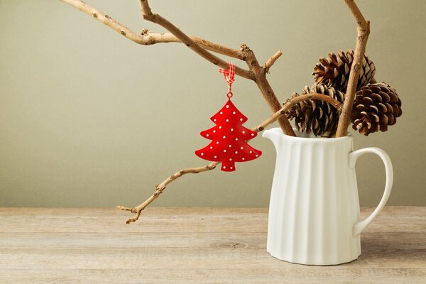 Christmas decoration in a white jug