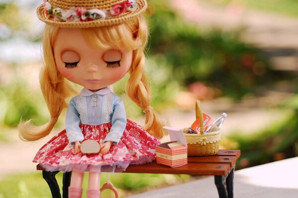 Cute doll breakfast outdoors