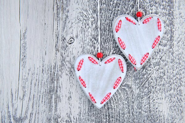 Handmade hearts on a tree background