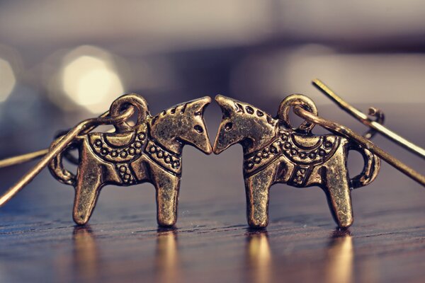 Bronze jewelry in the shape of horses