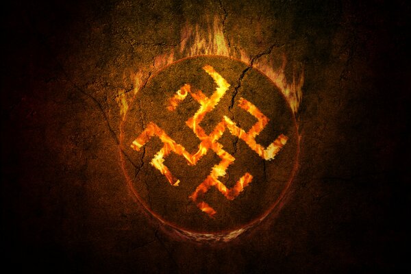 Огненный символ на темном фоне