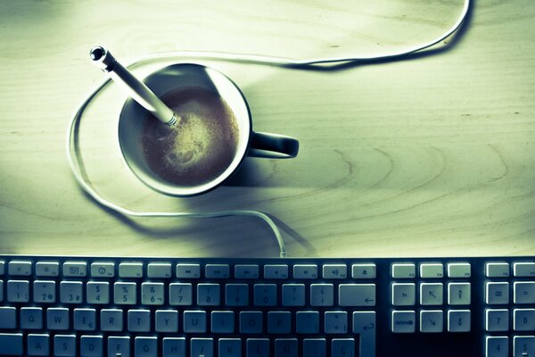 Wallpaper with keyboard and coffee on the desktop