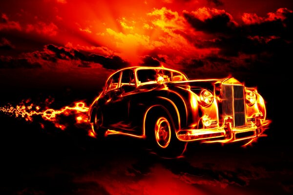 Piekielny płomień spod kół klasycznego samochodu, na tle czerwonego nieba