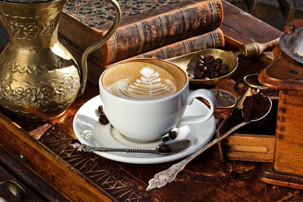 Beautiful white cappuccino cup on the table