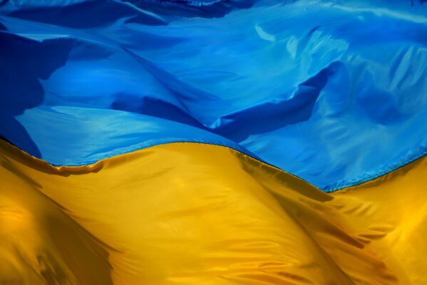 The Ukrainian flag flutters in the wind