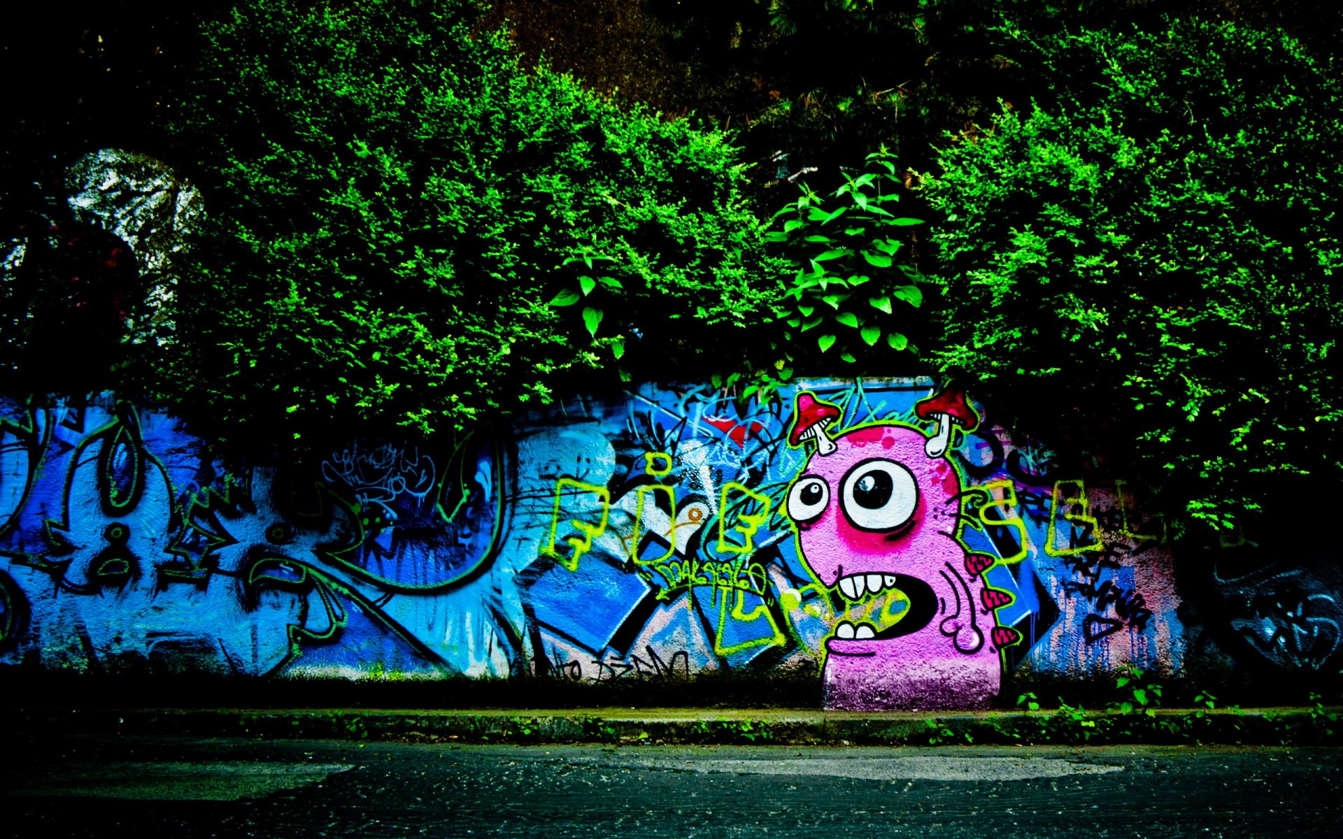 pared graffiti monstruo árboles acera