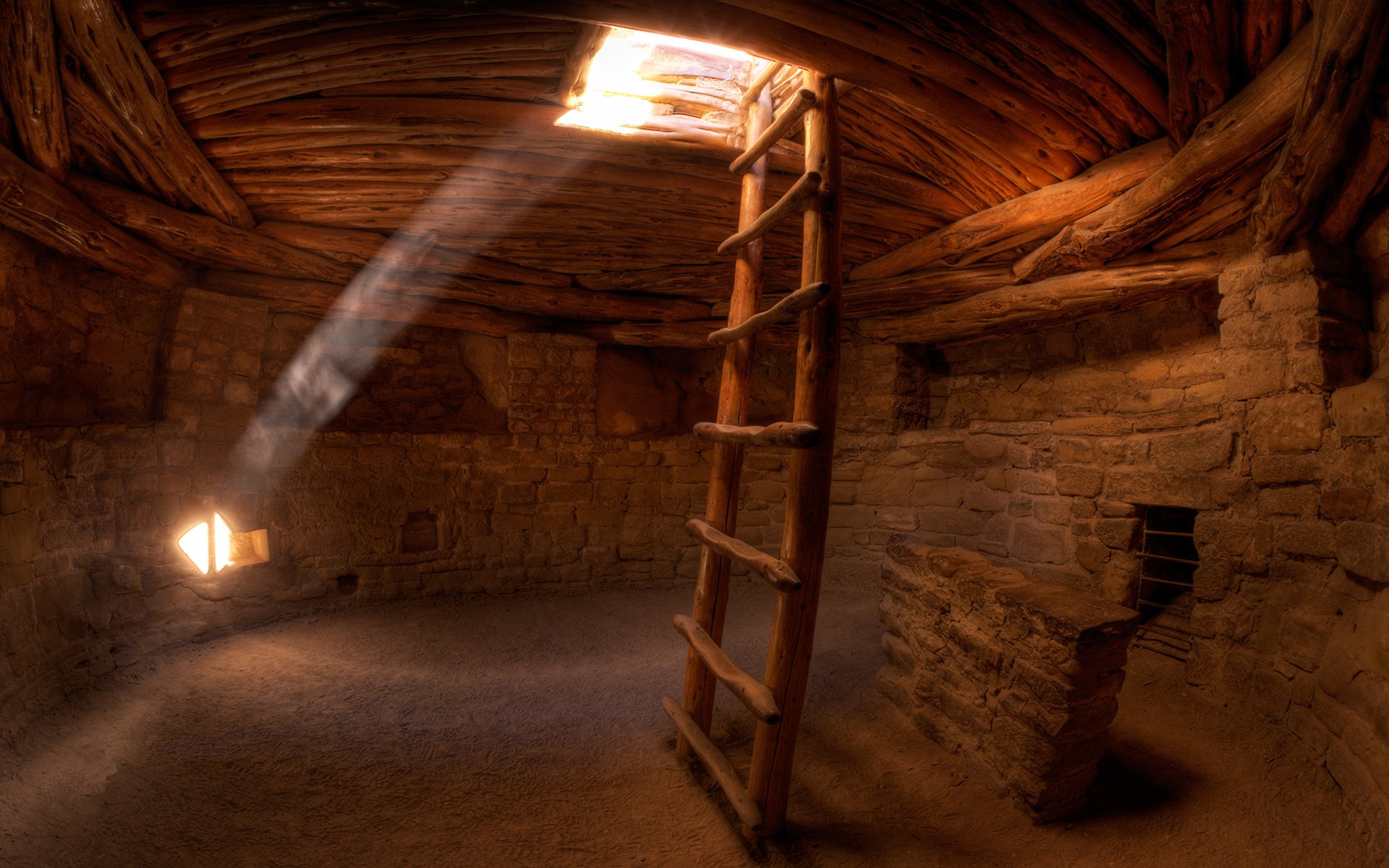 grotte escalier rayons de lumière soleil sable traces murs créatif