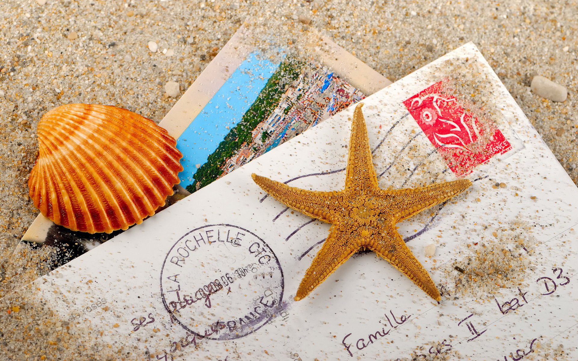 sable étoile de mer coquillage lettre