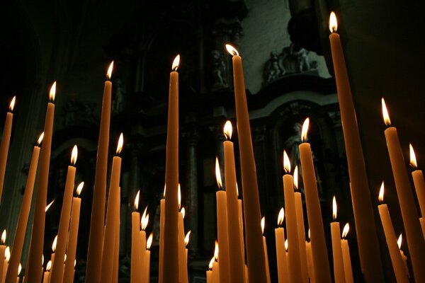 Wax candles are lit at the festival