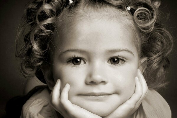 Portrait of a smiling girl with brown eyes