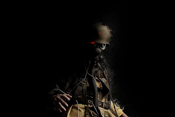 A soldier in a gas mask on a black background