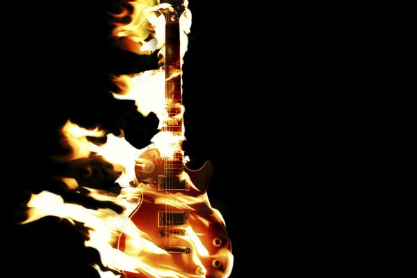 Stylish guitar in the flame of fire