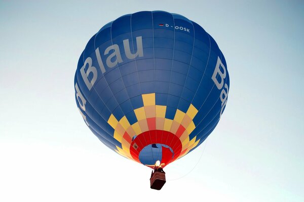 Blue balloon in the blue sky