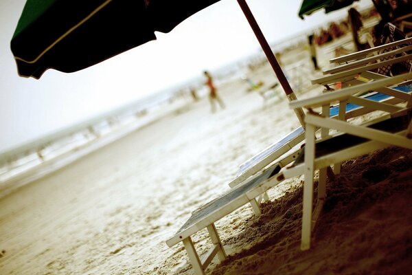 Summer, sand beautiful view under an umbrella