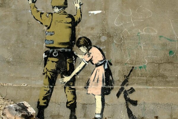 Graffiti - une fille fouille un soldat