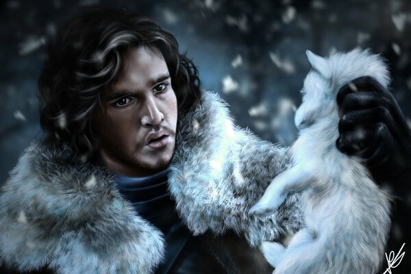 Game of Thrones. Jon Snow avec un loup dans les mains