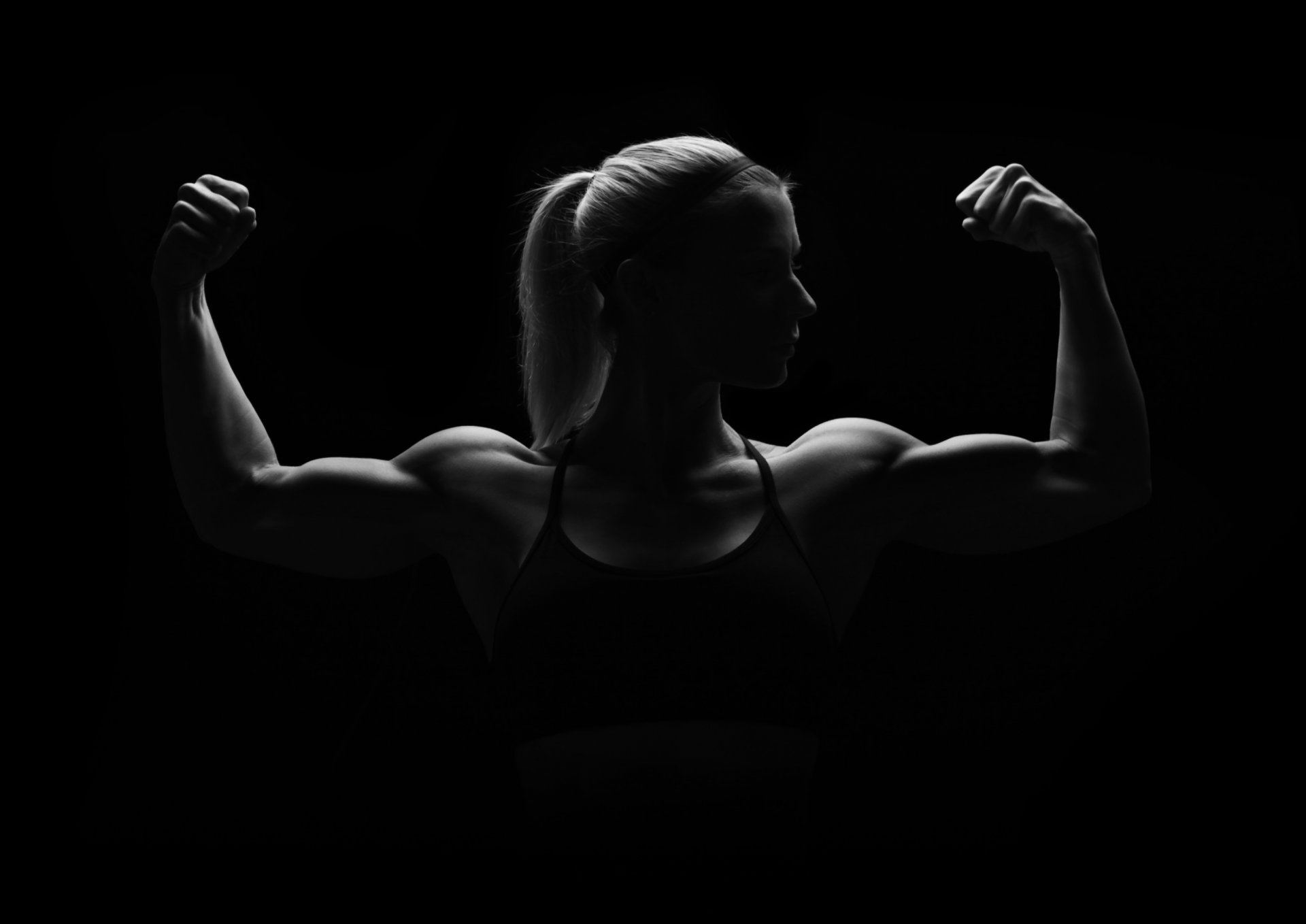 woman silhouette muscles pose