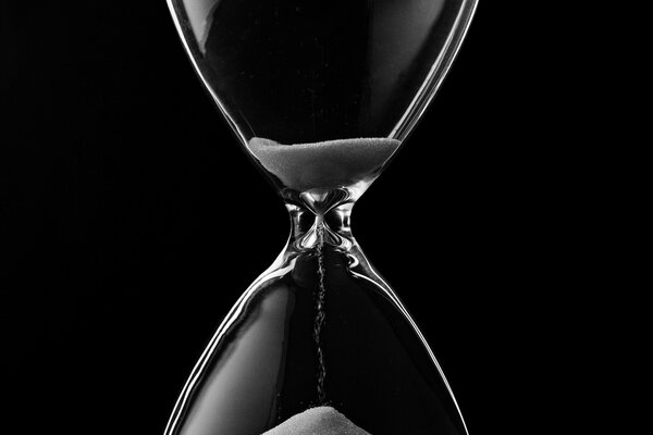 Black and white photo of an hourglass