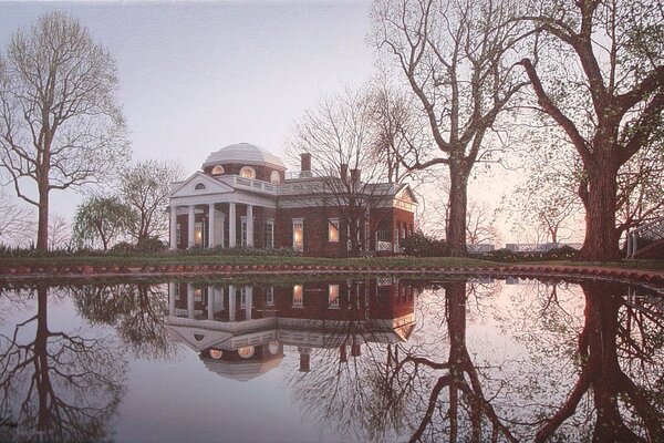 Photo of the estate with a pond