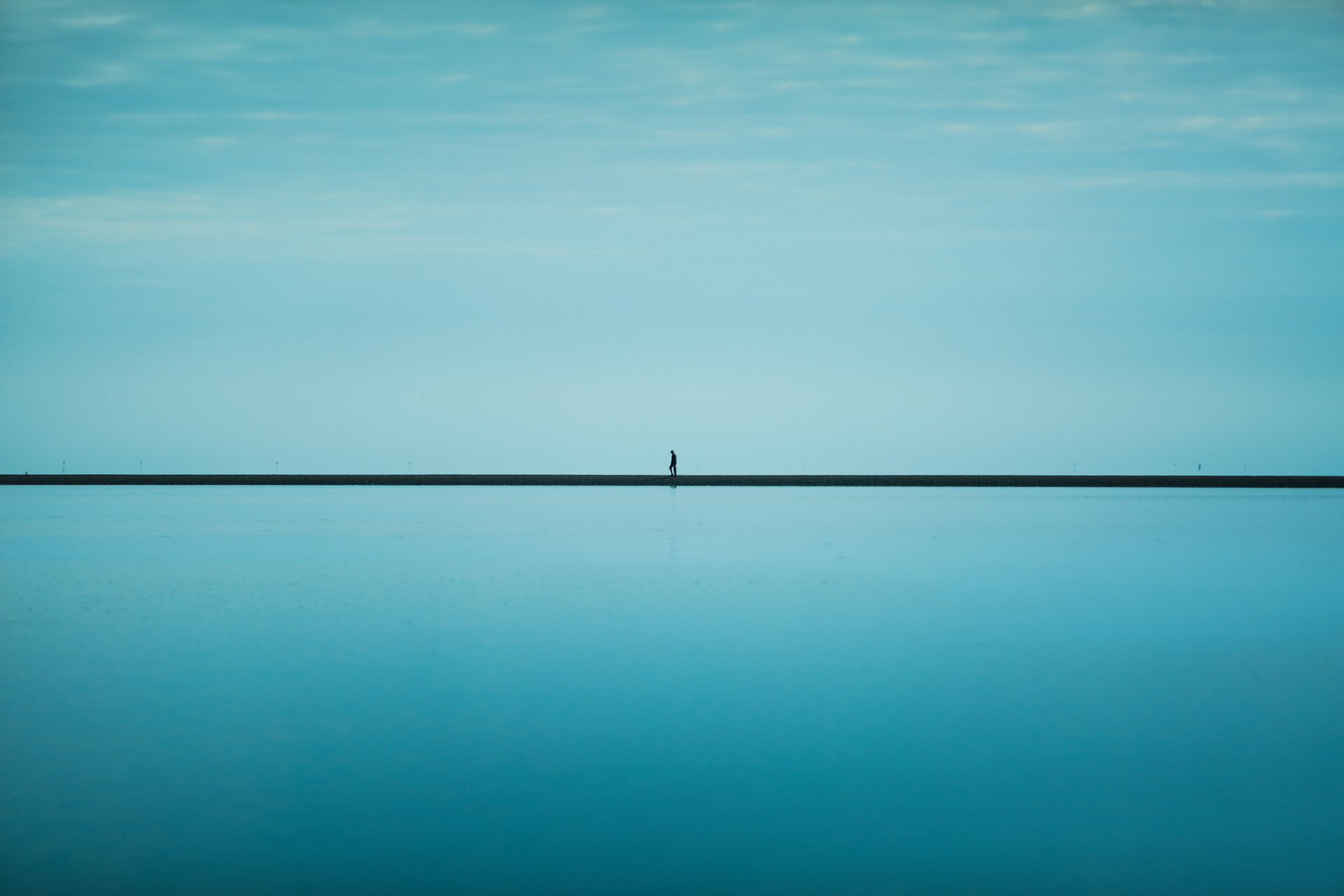 men line sea horizon blue sky infinity