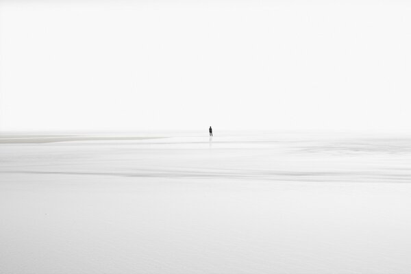 Black and white landscape man and sea