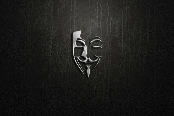 Silver logo anonymously on a dark background