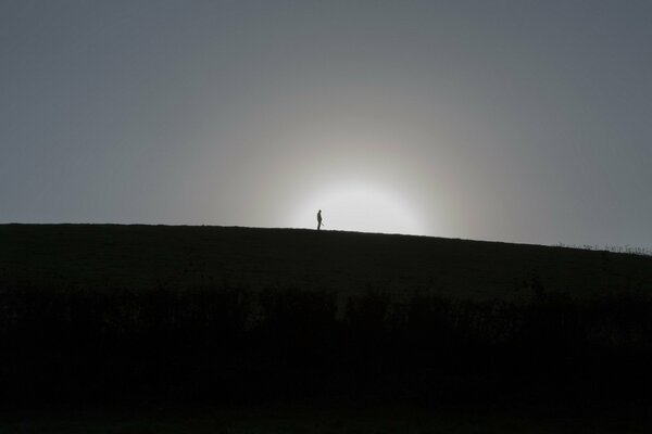 The silhouette of a man on another planet