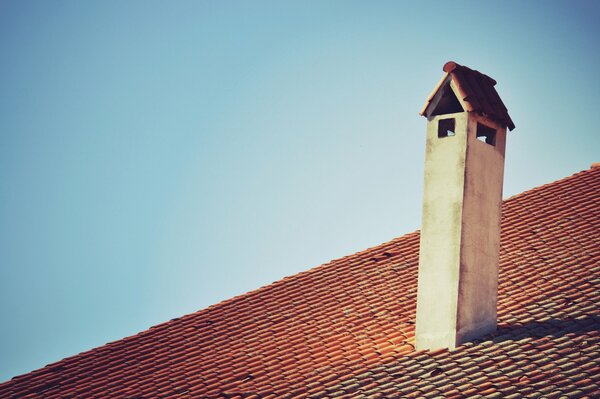 Chimney on a tiled roof