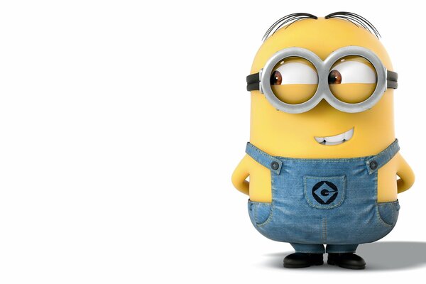 The minion has something in mind and is smiling