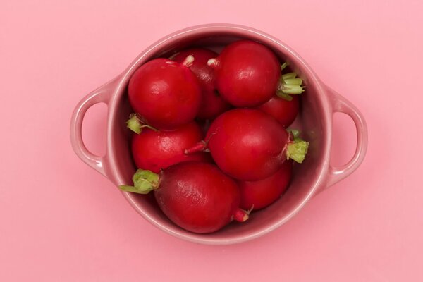 Pink cup with large radish