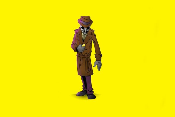Uomo misterioso in un mantello su sfondo giallo