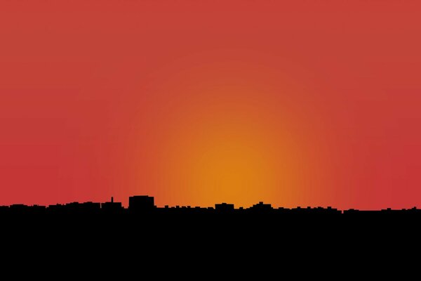 Silhouettes of buildings against the sunset