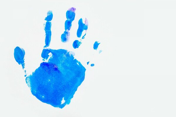 Blue handprint on a white background