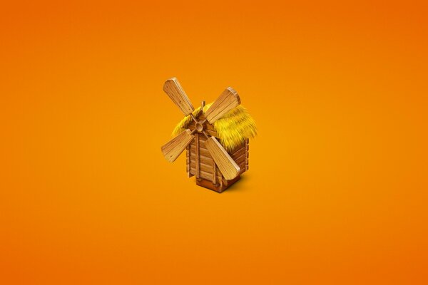 A lonely windmill on an orange background