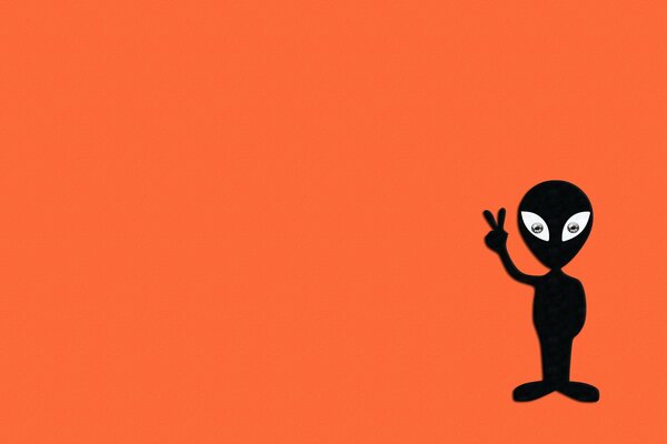 The alien shows a peace sign on a red background