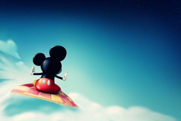 Mickey Mouse on a multicolored carpet in the clouds