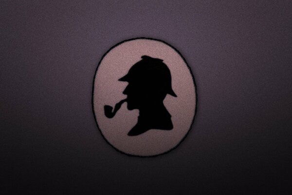 Médaillon de silhouette de Sherlock Holmes avec tube