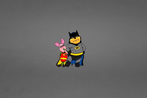 Piglet and Winnie-the-Pooh in Batman costumes